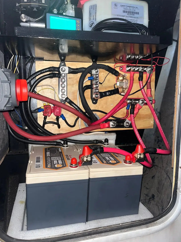 Electrical wiring, batteries and lifepo4 battery charger inside a vehicle's trunk