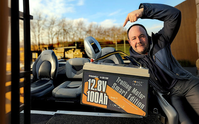 Person sitting inside a vehicle with a trolling motor lithium battery
