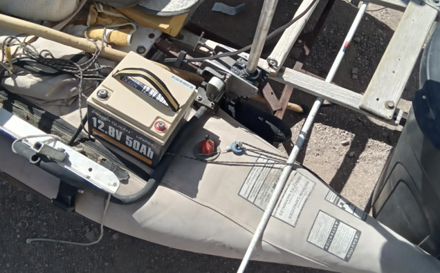 Power Queen 12v 50ah lithium battery for trolling motor on a boat deck